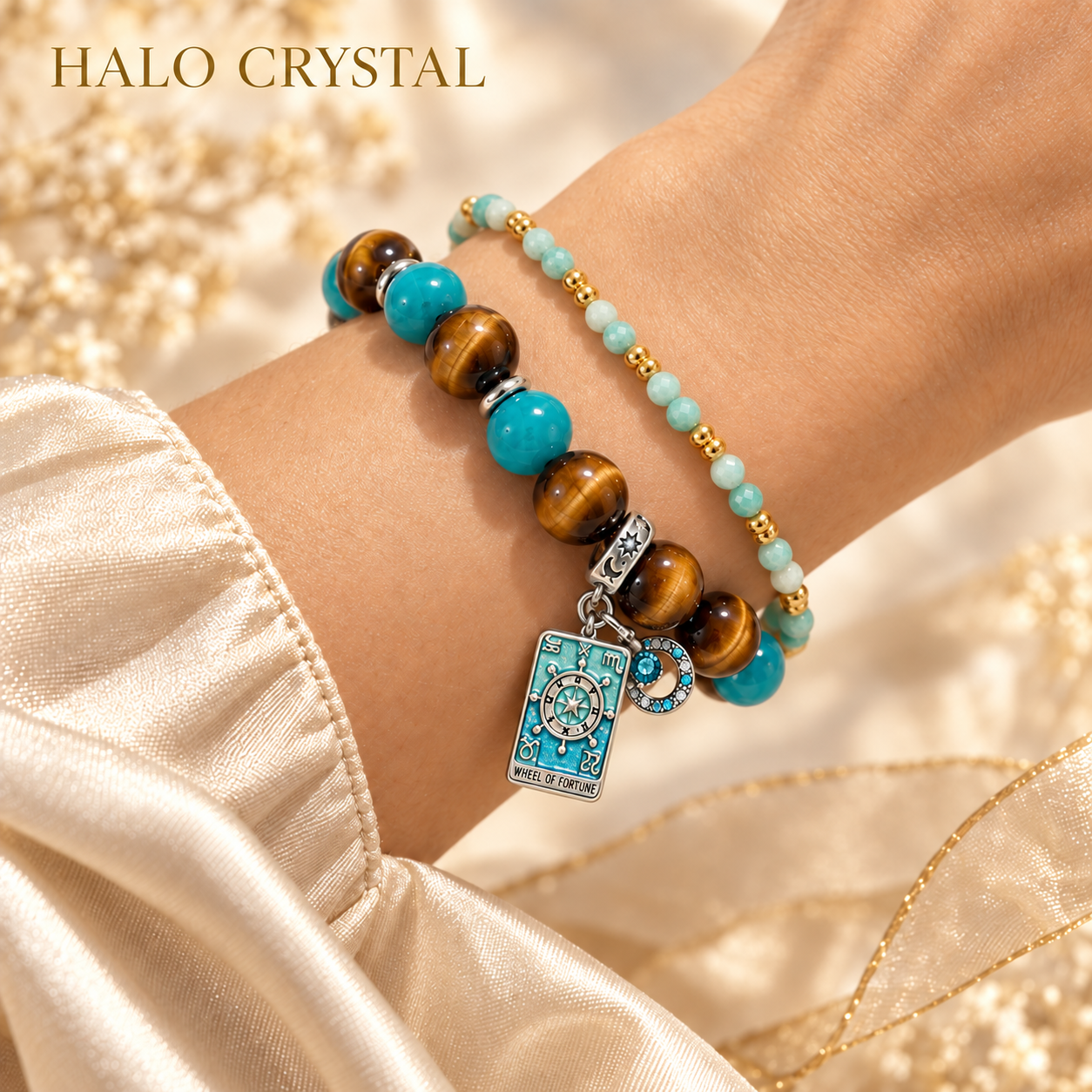 Wheel of Fortune tarot charm bracelet stacked with an amazonite faceted gemstone bracelet on wrist