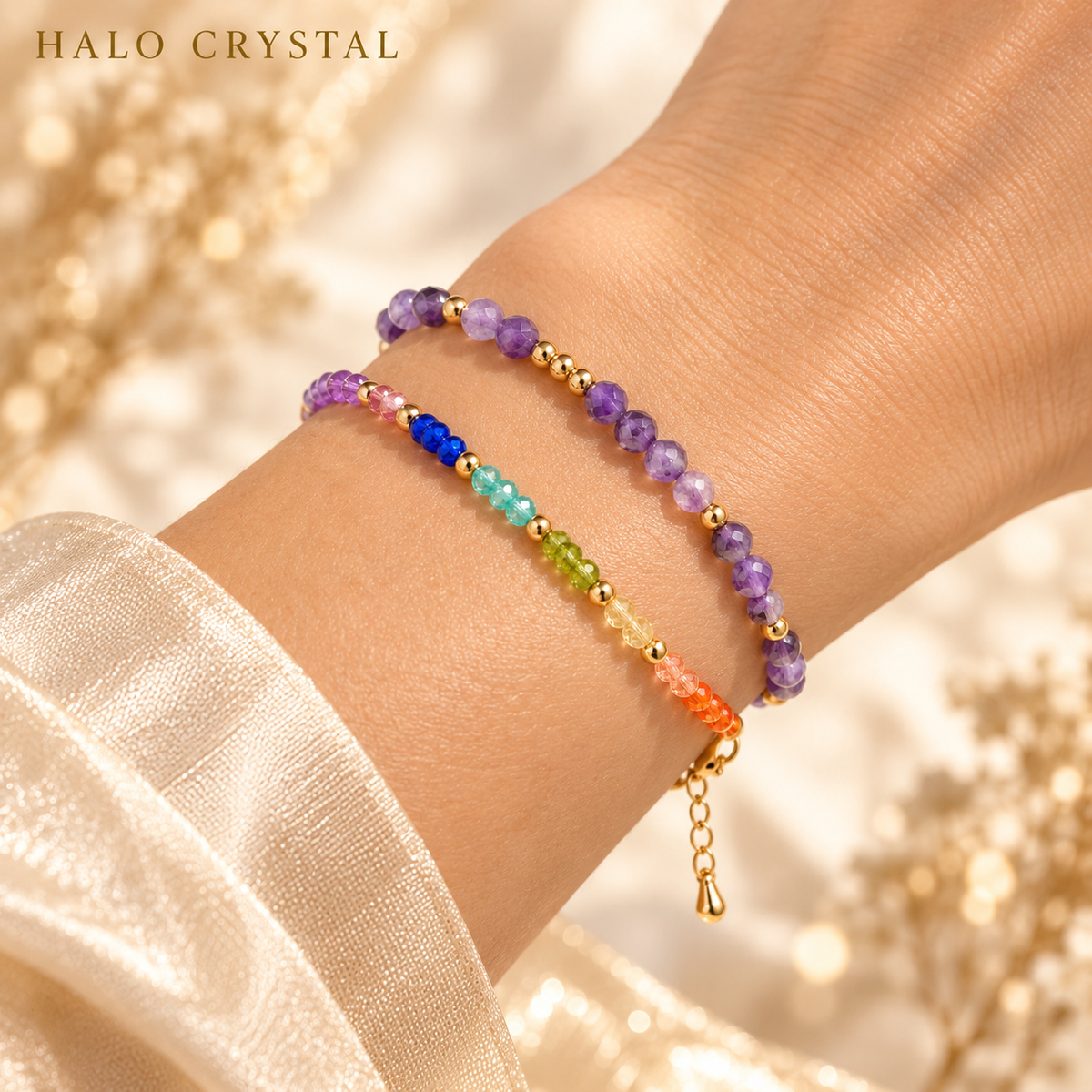 Seven chakra gemstone bracelet stacked with an amethyst faceted gemstone bracelet on wrist