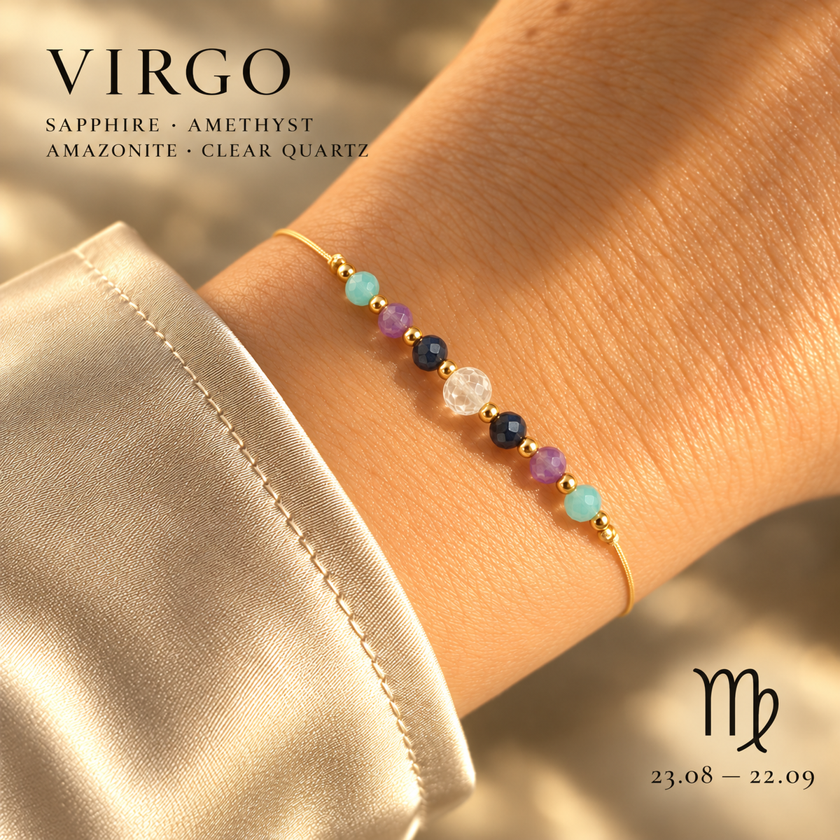 Zodiac crystal bracelet worn on wrist, adjustable gold-tone cord
