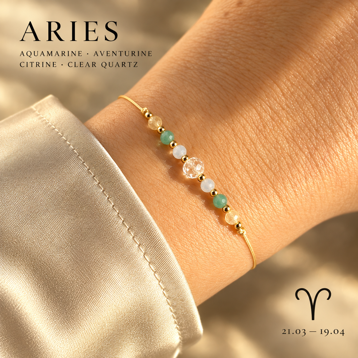 Zodiac crystal bracelet worn on wrist, adjustable gold-tone cord