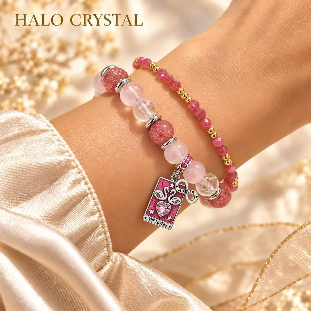 The Lovers tarot charm bracelet stacked with a pink tourmaline faceted gemstone bracelet on wrist